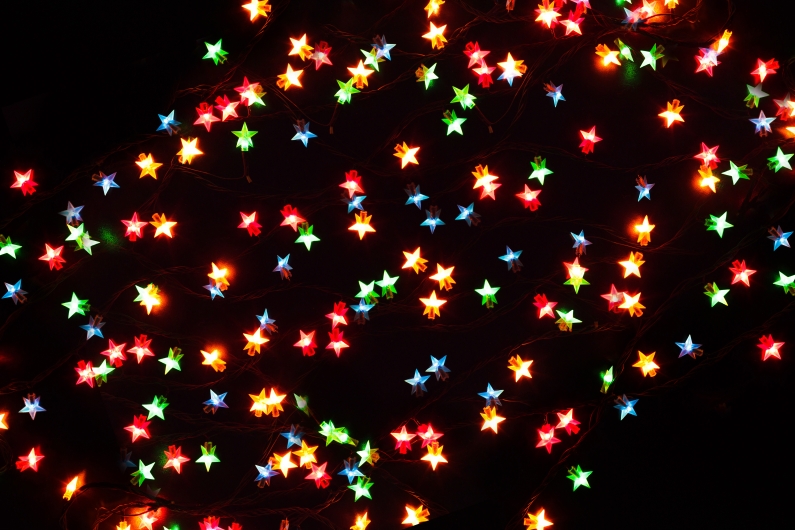 Christmas lights border on black background PAQGLQ6